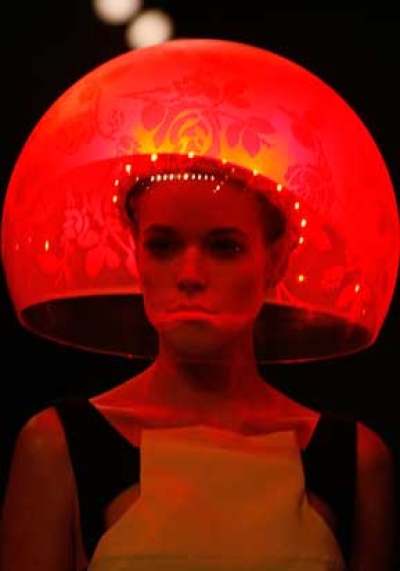 Red LED lit rose etched 'Summer hat'. For Hussein Chalayan
